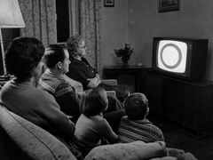 A family watches the first broadcast, 1968